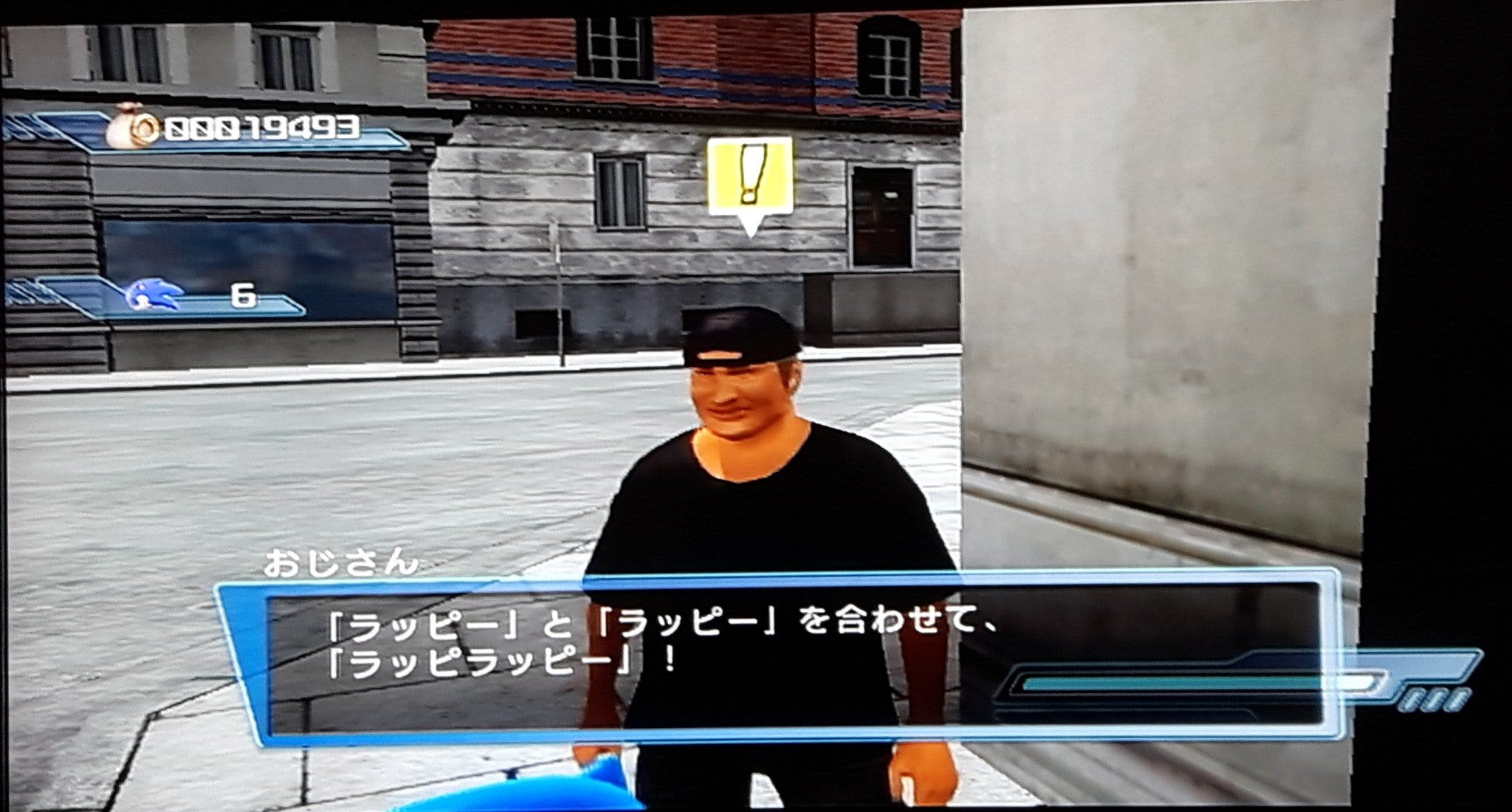 A man in a grey shirt and black, backwards baseball cap says “「ラッピー」と「ラッピー」 を合わせて、「ラッピラッピー」!”, or, “‘Luppy’ and ‘luppy’ combine to make ‘luppyluppy’!”